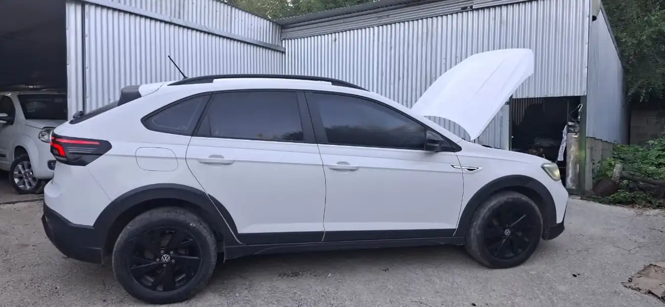 Foto de Impecable Volkswagen Nivus 170 TSI MT Año 2021